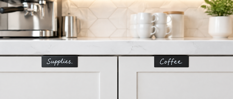 A black TidyPop label reading canned goods on a walnut cabinet above a gold-dot tile backsplash